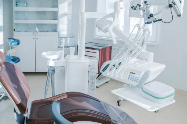 Dental Office Cleaning team sanitizing counters and sinks in a Toms River, NJ treatment room before opening